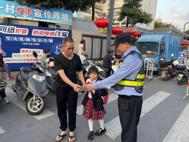 2月20日，古镇镇古一村关工委联合古一村治保会在古一小学开展“反邪护苗”宣传活动。.png