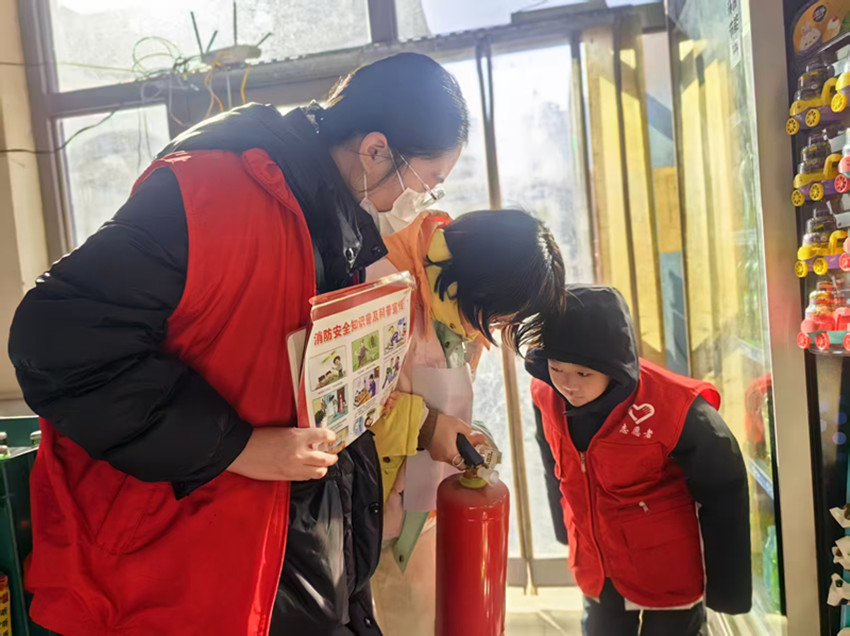 西城街道惠宁东社区“平安春节，防火先行”活动照片2_副本.jpg