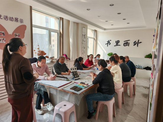 西城街道新景四季东社区：“墨润邻里，书韵社区”活动照片1.png