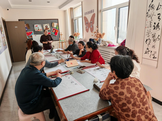 西城街道新景四季东社区：“墨润邻里，书韵社区”活动照片2.png